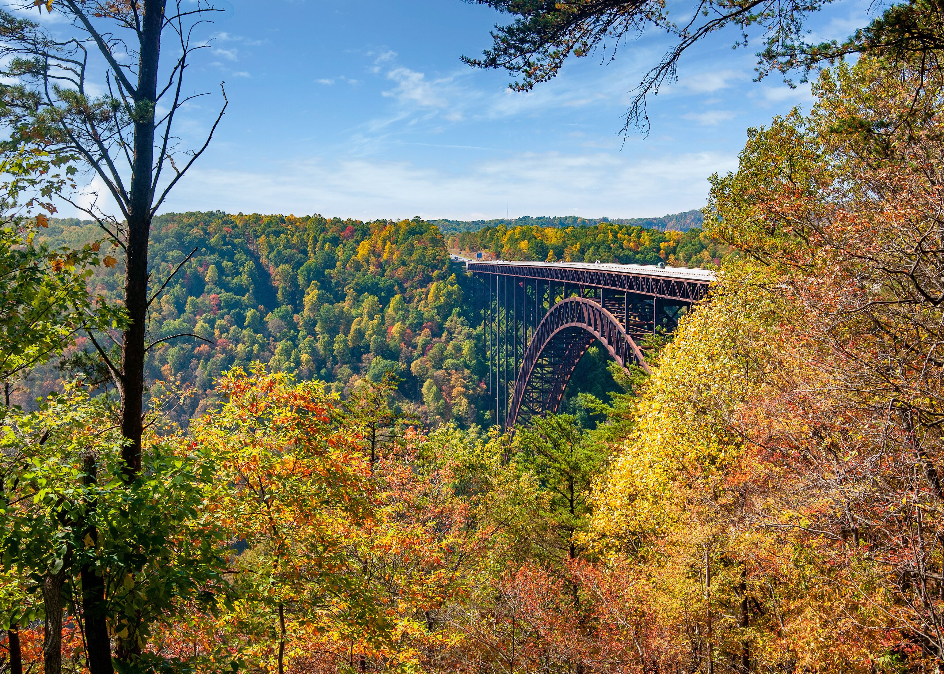 A colorful fall landscape of the New River Gorge Bridge in West Virginia. Taken in October when the autumn foliage was at its peak.