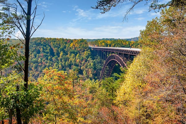 A colorful fall landscape of the New River Gorge Bridge in West Virginia. Taken in October when the autumn foliage was at its peak.