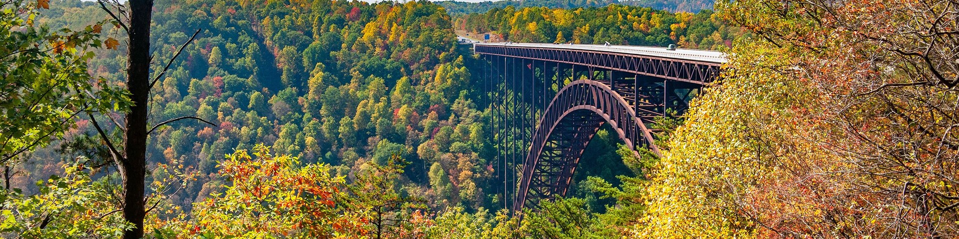 A colorful fall landscape of the New River Gorge Bridge in West Virginia. Taken in October when the autumn foliage was at its peak.