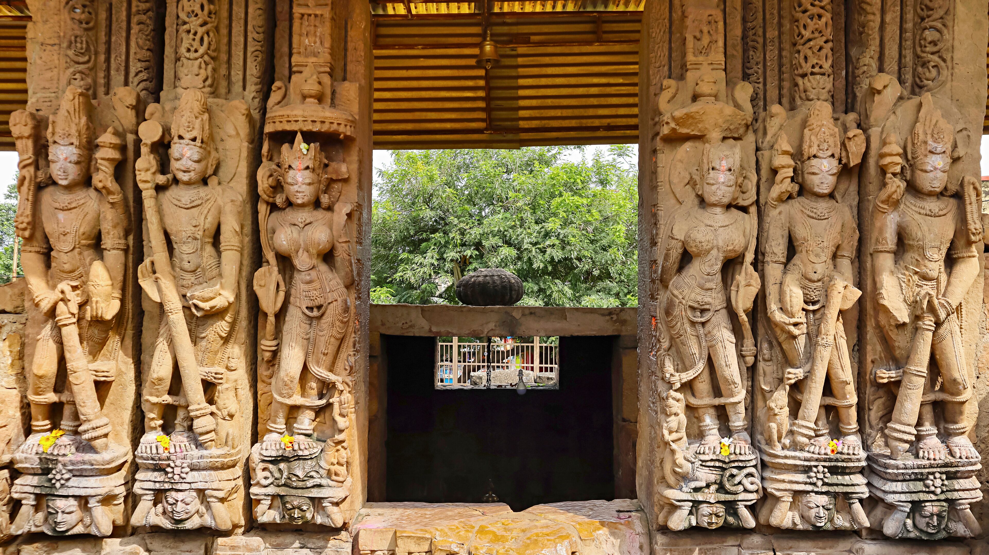 Carvings of Ganga, Yamuna and Dwarapala on the Shri Pataleshwar Temple, Malhar, Bilaspur, Chhattisgarh, India..