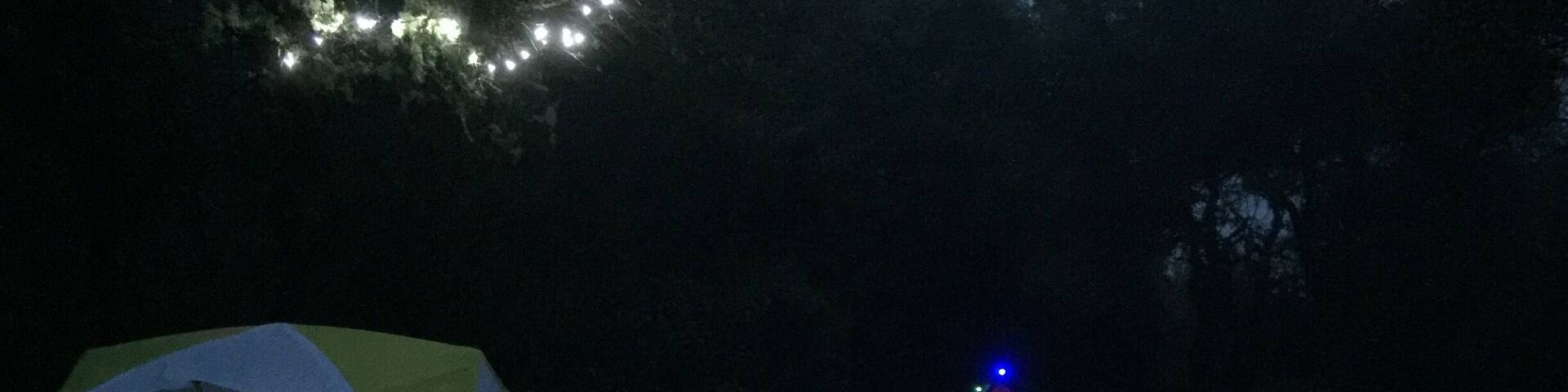 String lights make the campsite feel like home. Old versus new. The orange tent is from the 70's and over 40 years old. The yellow tent was purchased this year in 2016. Guess who stayed drier? 😅 #microadventure