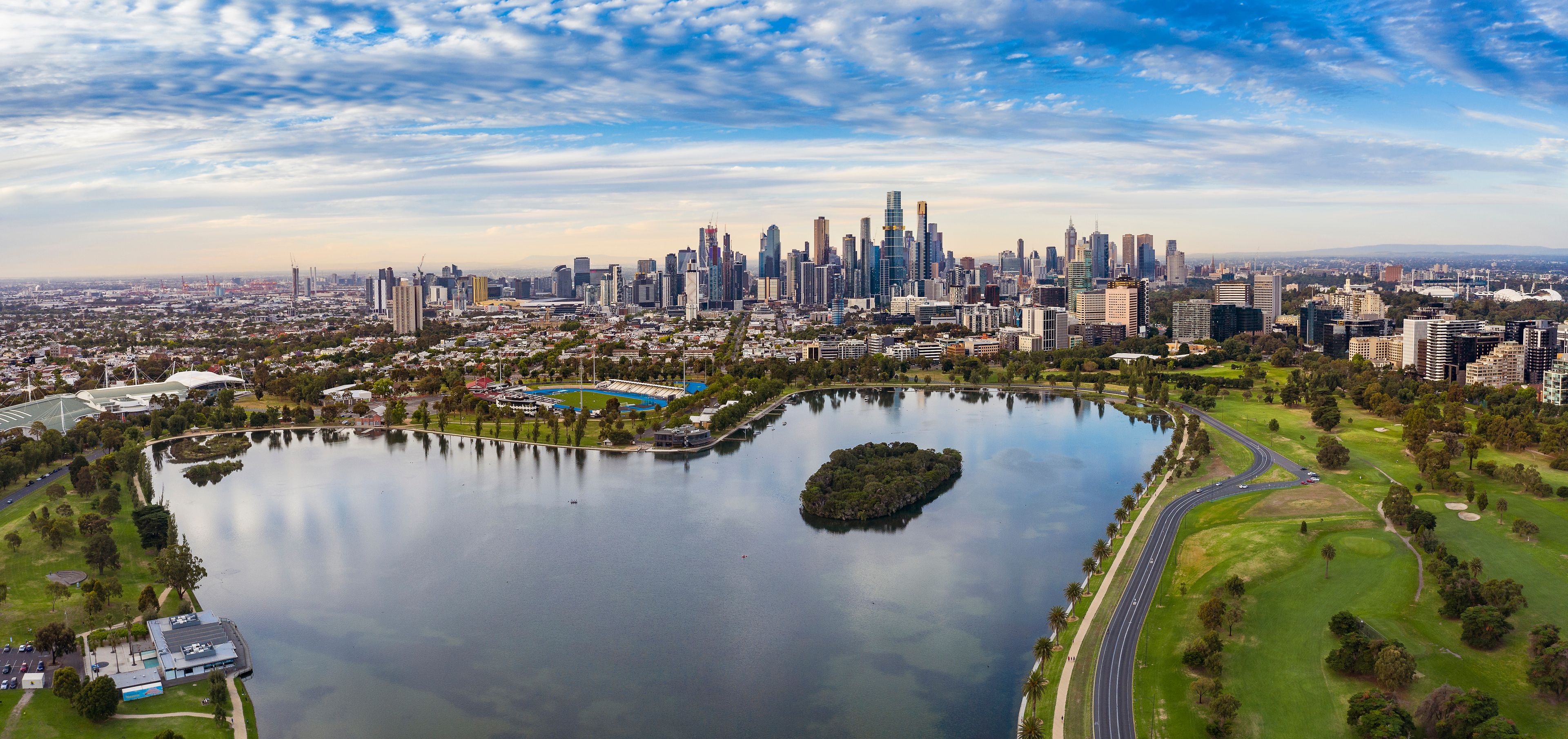 Panoramic view of the beautiful city of Melbourne as captured from above Albert Park Lake late in the afternoon