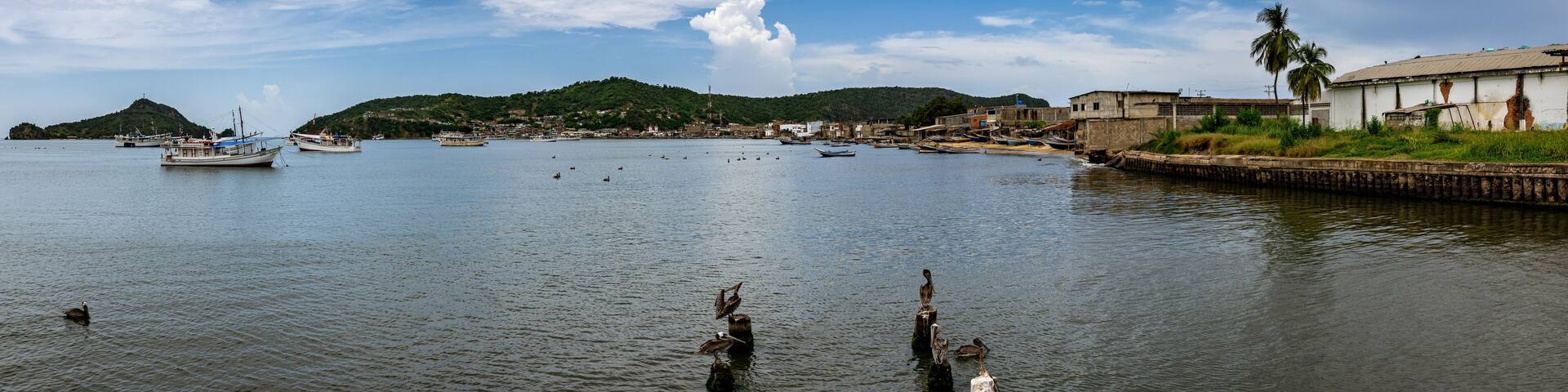 Panoramic view of Carupano dock. Boats anchored near to shore. Sucre State, Venezuela