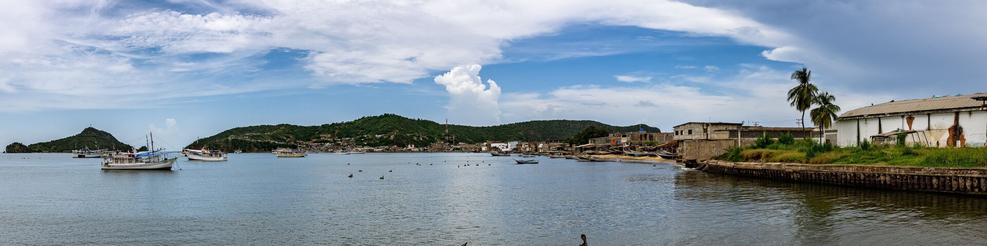 Panoramic view of Carupano dock. Boats anchored near to shore. Sucre State, Venezuela