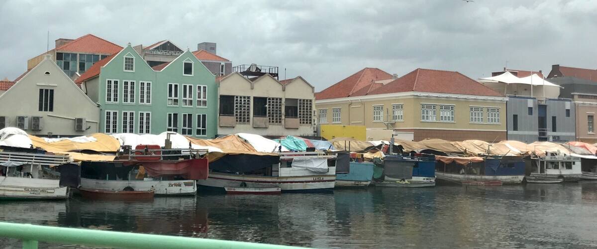 Boaters from Venezuela being fresh produce to sell at the Floating Market in Curacao