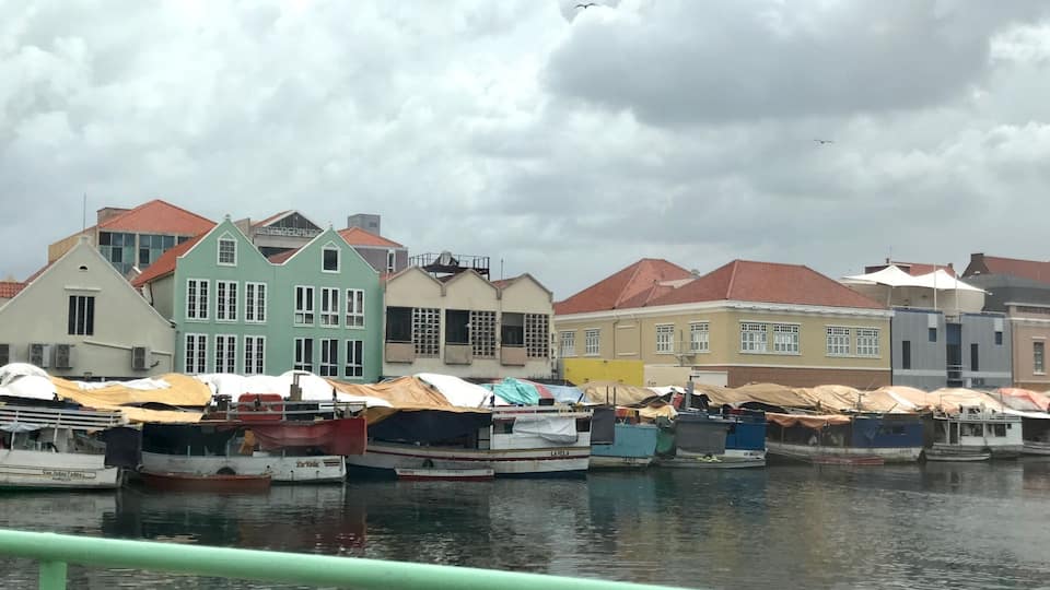 Boaters from Venezuela being fresh produce to sell at the Floating Market in Curacao