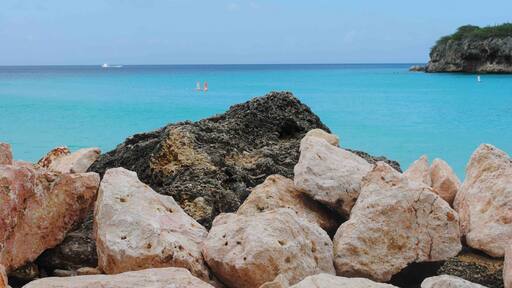 Playa Kenepa are among the most stunning natural beaches on Curacao. Consisting of two beaches, Kenepa Grandi (bigger beach) and Kenepa Chiki (the smaller more intimate beach) it is the perfect location for snorkeling and scuba diving. The turquoise water is crystal clear and you can see the breathtaking views of underwater caves and gorgeous coral reef. Itโs rarely heavily populated so itโs like having your own private beach and personal slice of heaven.
