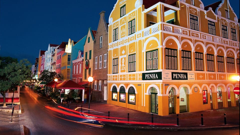 Willemstad showing night scenes, a city and street scenes