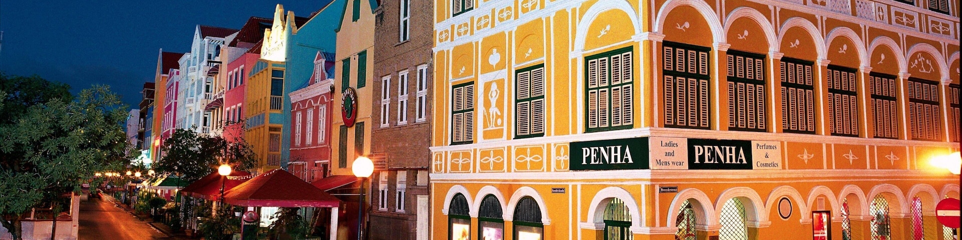 Willemstad showing night scenes, a city and street scenes