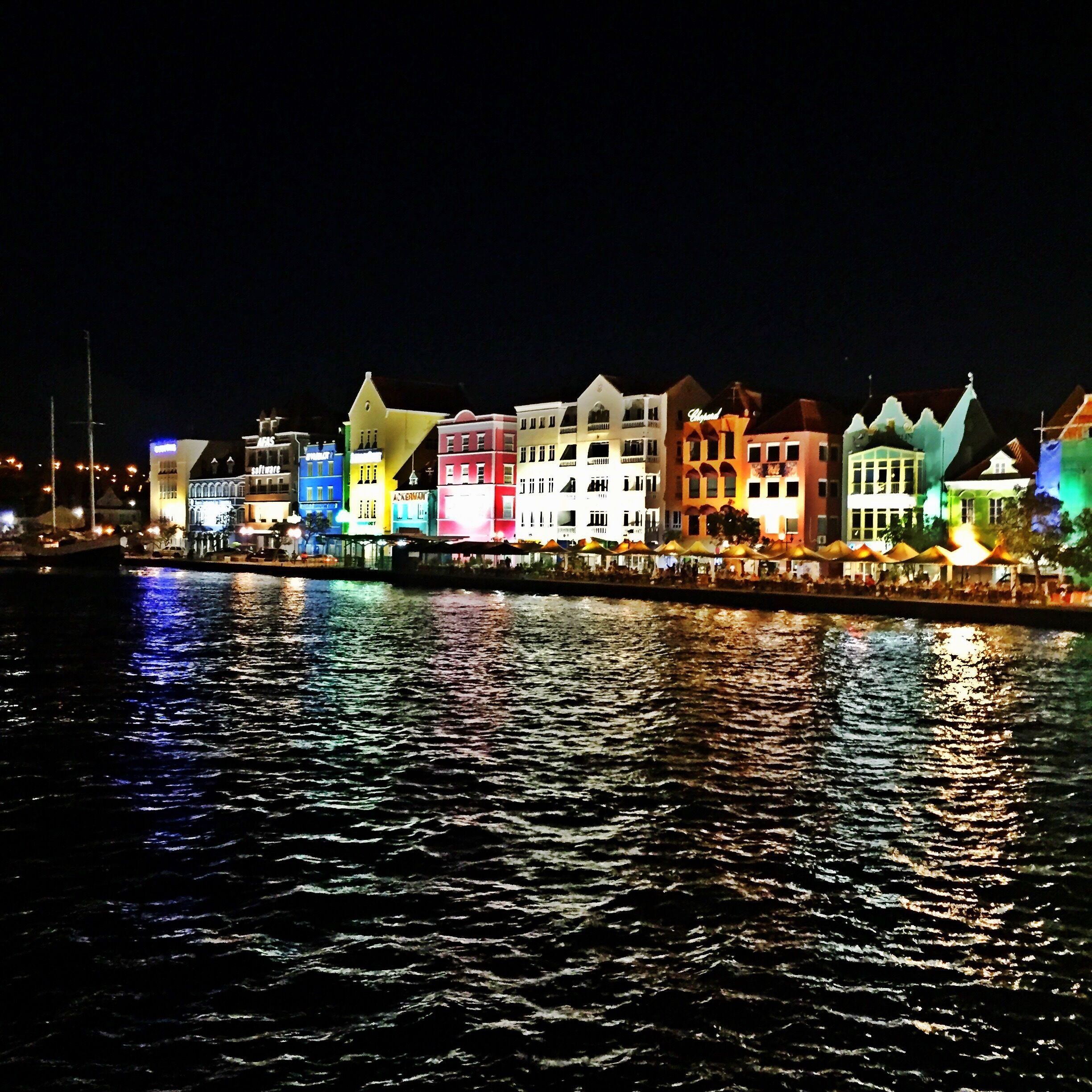 The view of the colorful Otrobanda in Curaçao as seen from the Queen Emma bridge. 