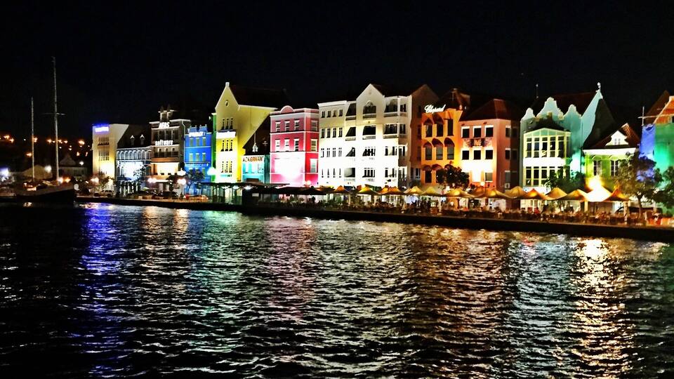 The view of the colorful Otrobanda in Curaçao as seen from the Queen Emma bridge.