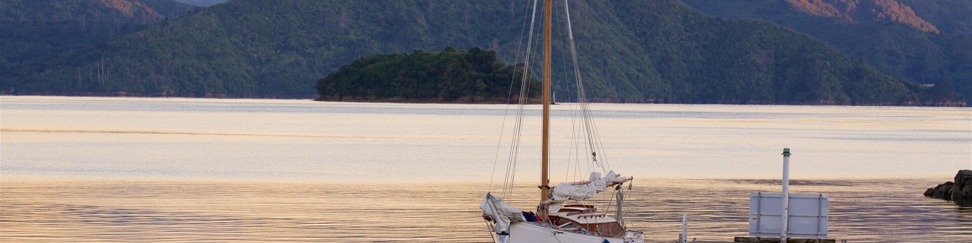 Picton featuring a sunset, mountains and sailing