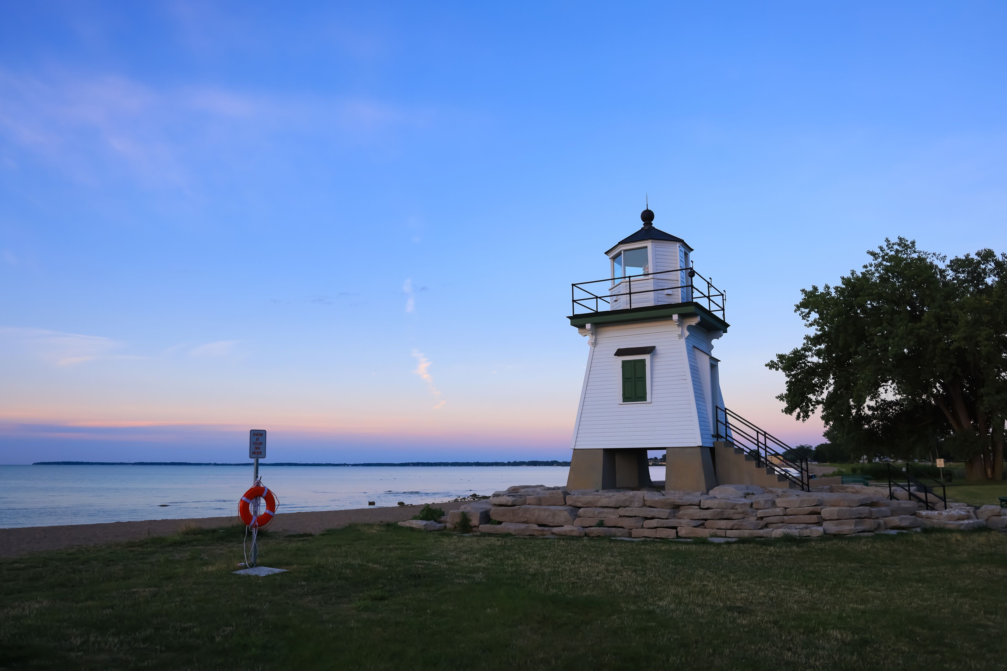 Scenic view of Port Clinton lighthouse in evening light, is restored, built in 1896 and placed at the entrance of the Portage River