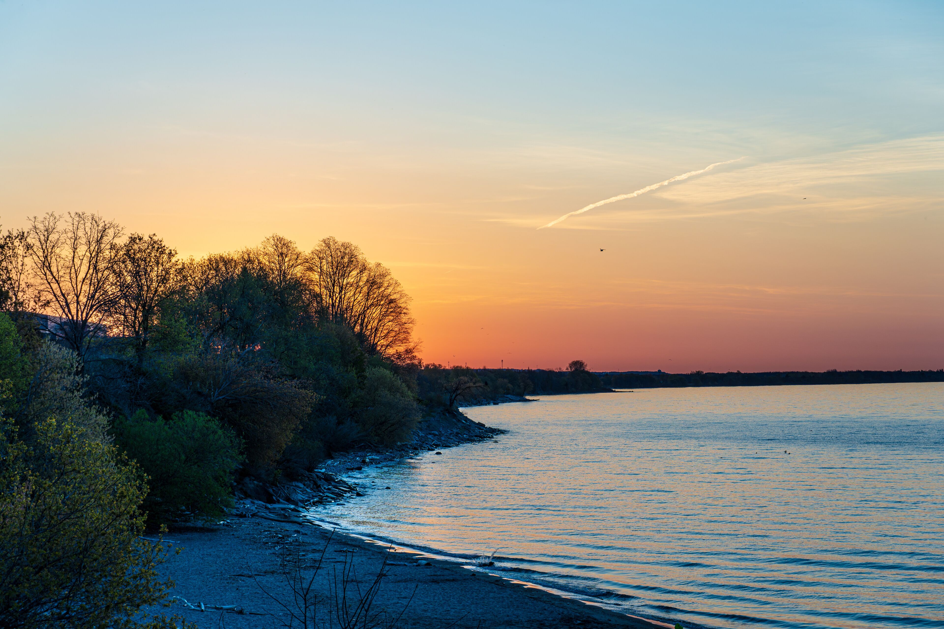A view of East Beach in Port Hope from the cliffs at daybreak of a clear spring day.