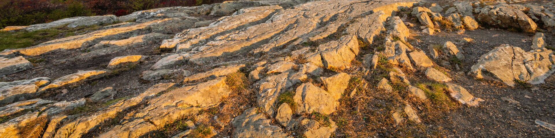 High Point State Park, NJ, overlooking tri-states with Matamoras, PA, and Port Jervis, NY, as fog rises over Delaware River on a late fall morning banner size