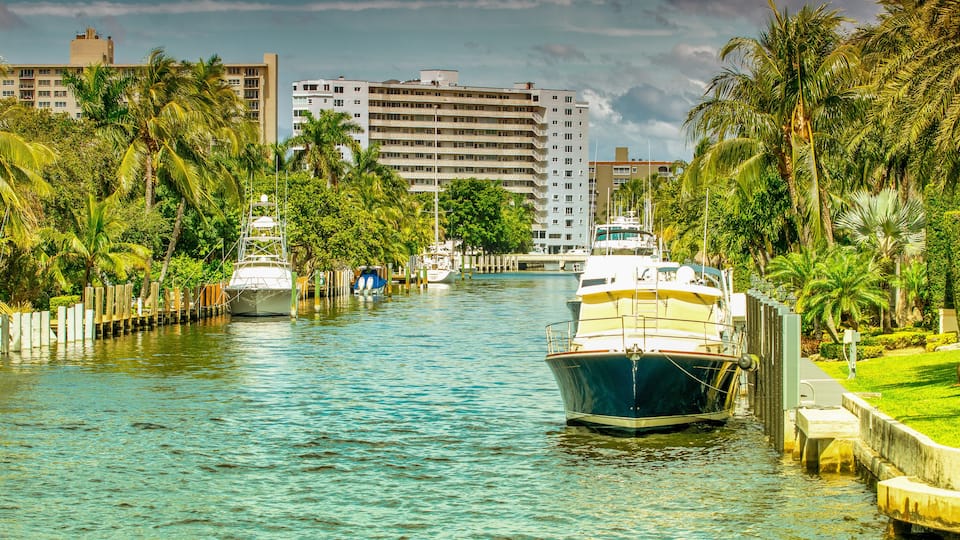 Fort Lauderdale, Florida. Beautiful view of city canals with boats and buildings on a sunny winter day