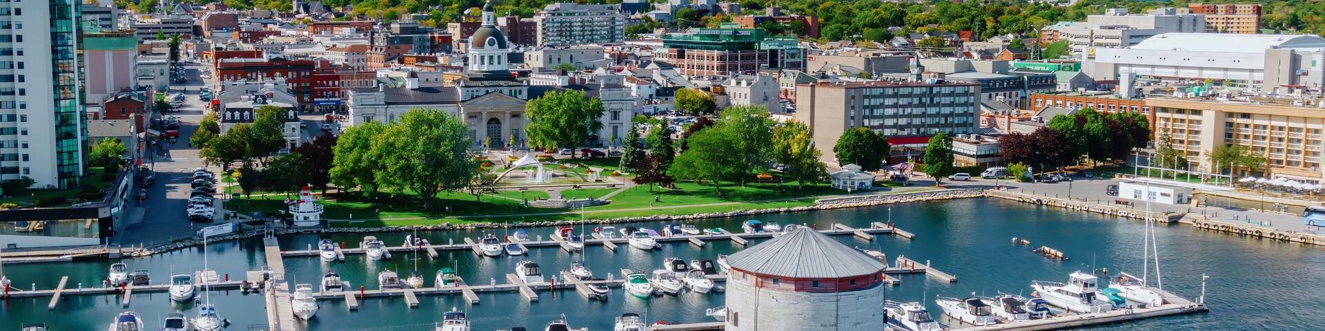 Marina on the Riverfront of the St Lawrence River in Downtown Kingston. In the background is the Kingston City Hall. Ontario, Canada.