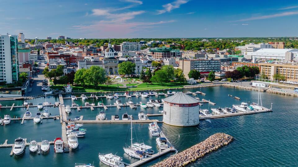 Marina on the Riverfront of the St Lawrence River in Downtown Kingston. In the background is the Kingston City Hall. Ontario, Canada.