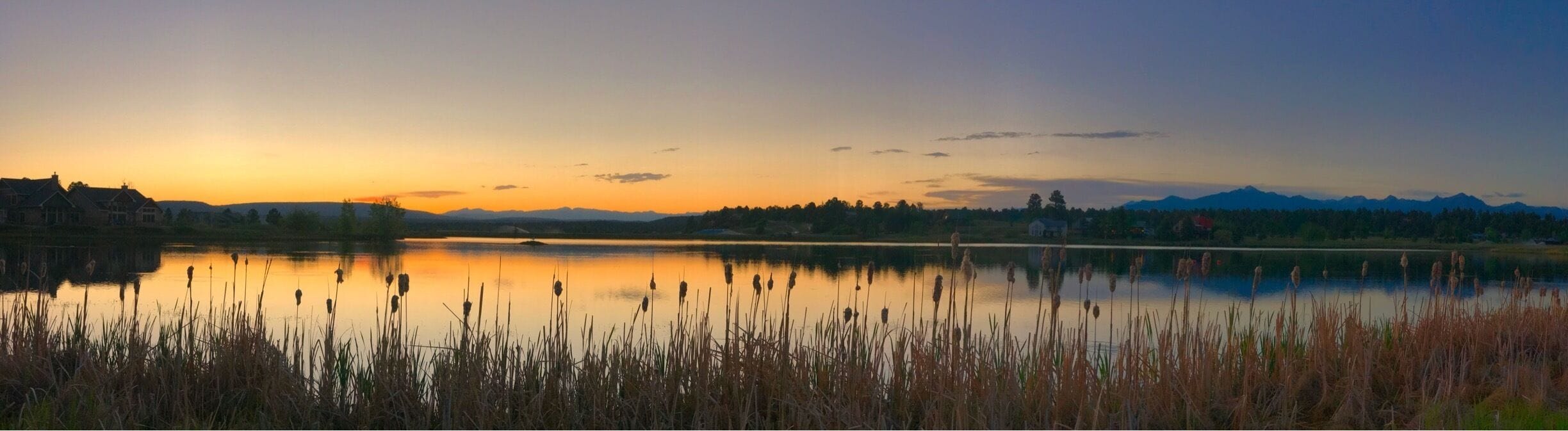 Sunset over the lake in Pagosa CO. Pagosa Springs has an amazing hot spring resort on the river with many tubs cut into the riverside of different temperatures and salinity. Above the old town of Pagosa Springs is a newer development the has a lake with an view towards Pagosa Peak and the Window area of the Continental Divide. There are also hot springs located hidden away in the mountains in this picture ( Rainbow hot springs). In case you are interested photo taken with an iPhone