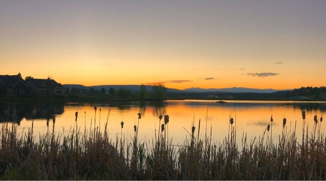 Sunset over the lake in Pagosa CO. Pagosa Springs has an amazing hot spring resort on the river with many tubs cut into the riverside of different temperatures and salinity. Above the old town of Pagosa Springs is a newer development the has a lake with an view towards Pagosa Peak and the Window area of the Continental Divide. There are also hot springs located hidden away in the mountains in this picture ( Rainbow hot springs). In case you are interested photo taken with an iPhone