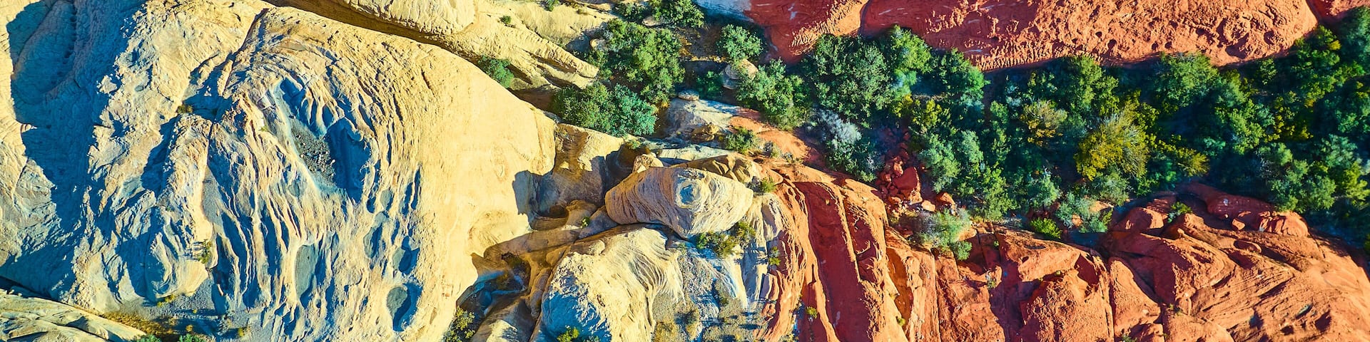 Aerial Top Down of Vibrant Red Rock Canyon Desert Landscape