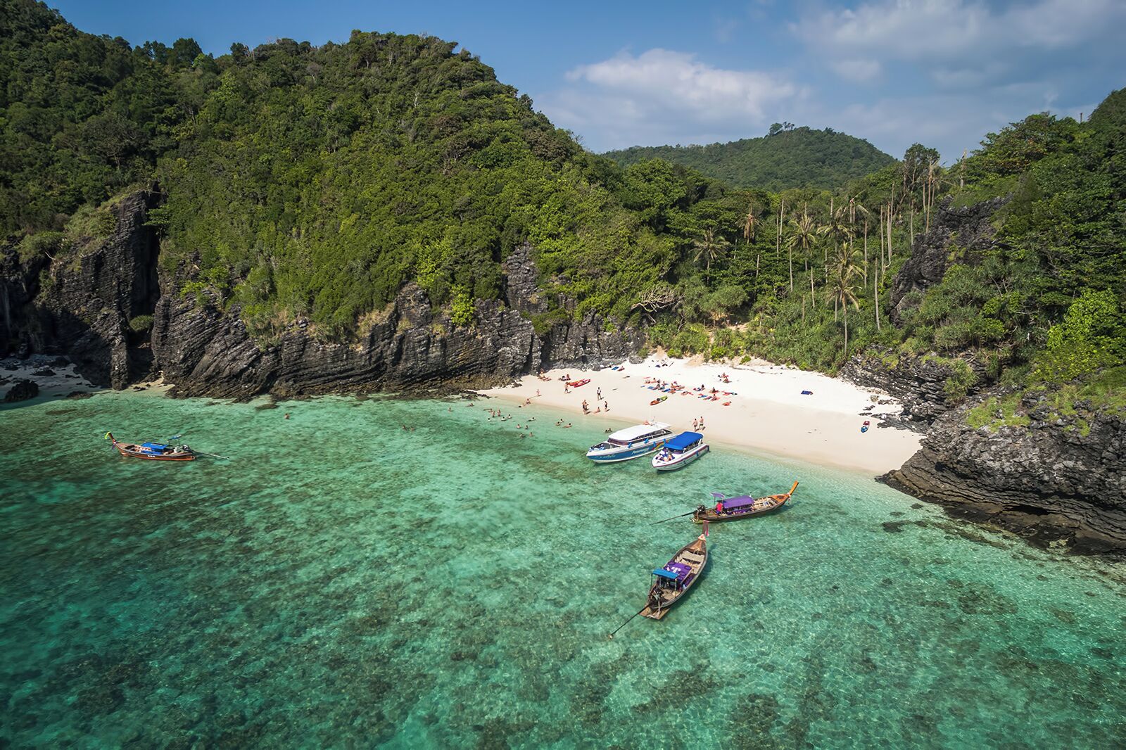 Nui Beach is a tiny strip of sand on the west coast of Phi Phi Don Island. Getting there is not that easy; the beach can be reached by boat (that's the easiest way) or on foot from Loh Lana Bay, after a short by strenuous hike through the jungle. As the photo shows, snorkelling here is great. #LifeAtExpedia