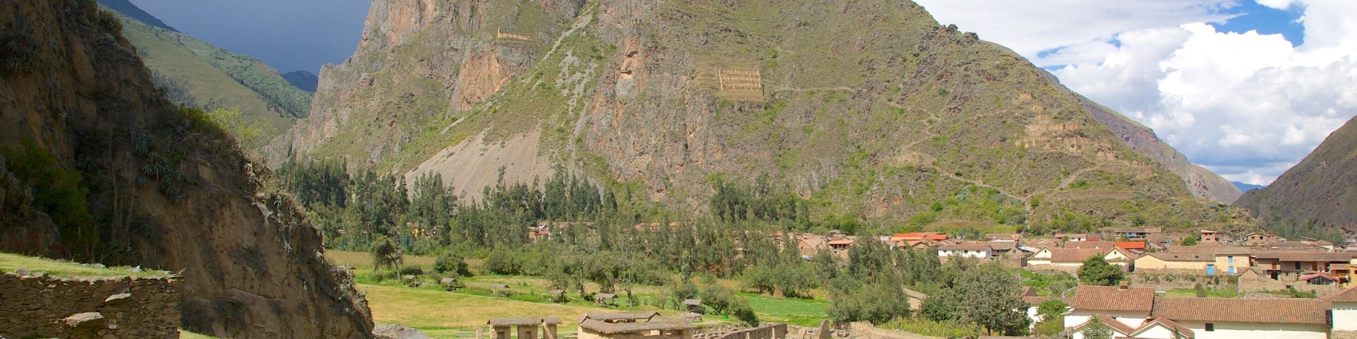 Cusco featuring a small town or village, landscape views and a ruin