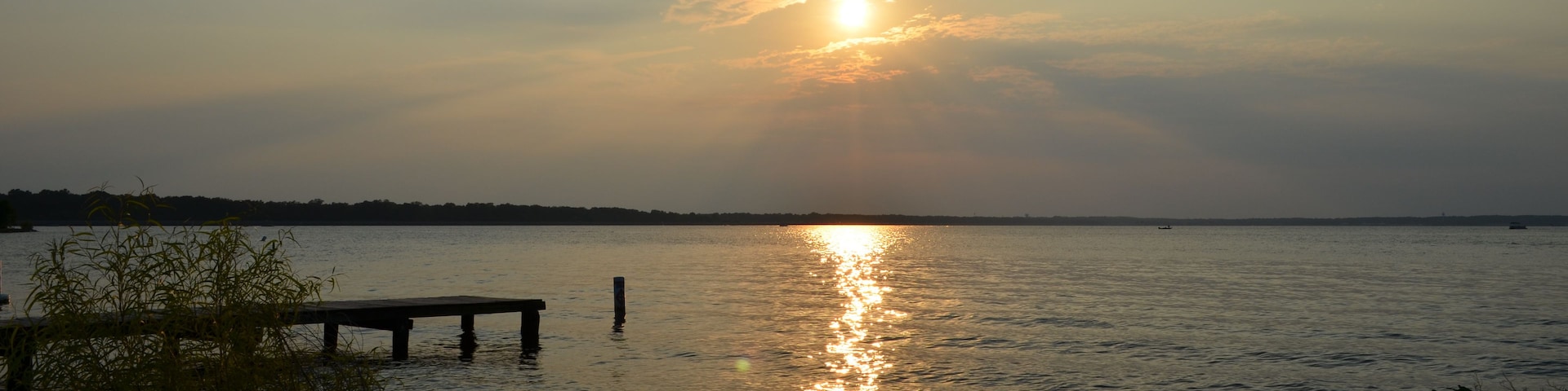 pier at the Ross Barnett reservoir at sunset
