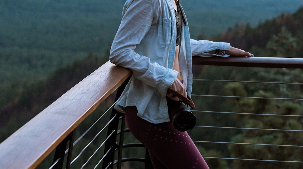 Woman enjoying sunset, Payson, Mogollon Rim, Arizona, United States