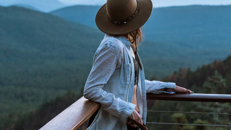 Woman enjoying sunset, Payson, Mogollon Rim, Arizona, United States