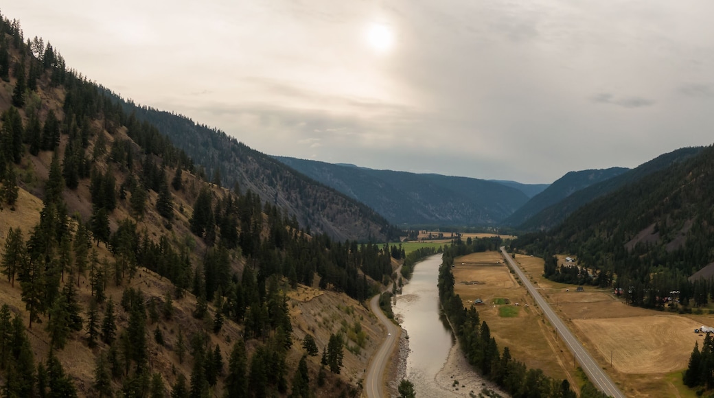 Aerial Panoramic View of a scenic Highway in the Valley surrounded by Canadian Mountain Landscape. Taken near Princeton, British Columbia, Canada.