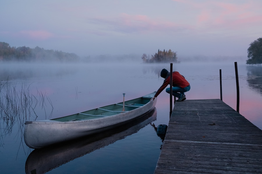 Person preparing to go canoeing