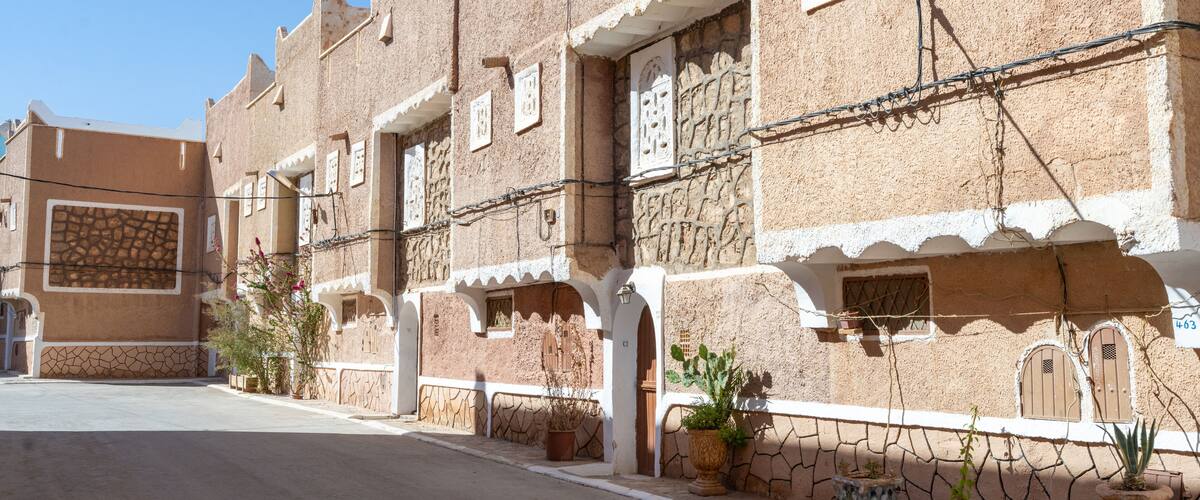 Traditional architecture of Ghardaïa, Algeria – View of the mud houses and minaret of the old town