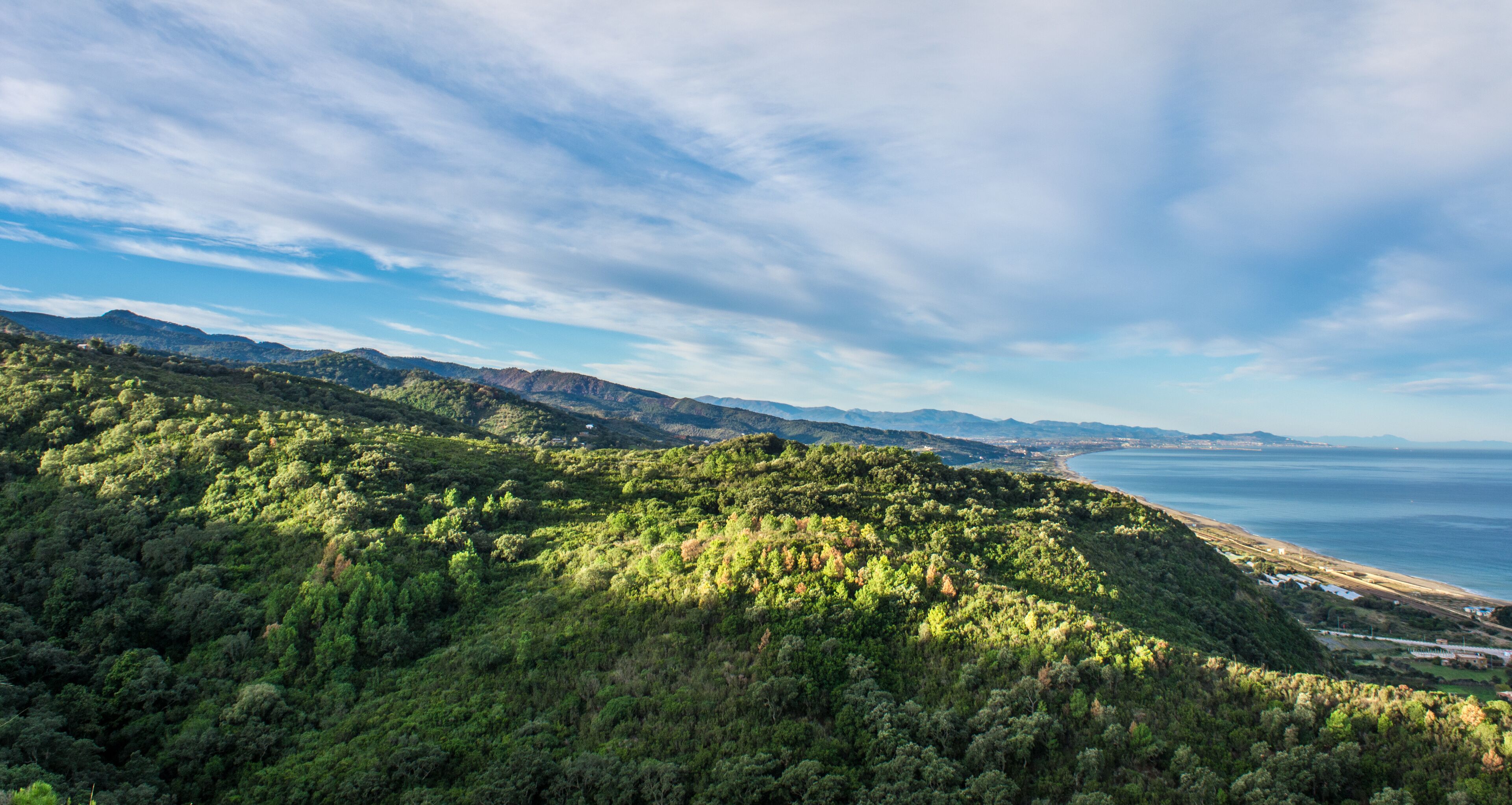 landscape of mountains, sunset and clouds with a beautiful sky, the nature of Algeria in North Africa, Maghreb, plains and grass in the mountain, Mediterranean climate, Forest and green trees. sunrise