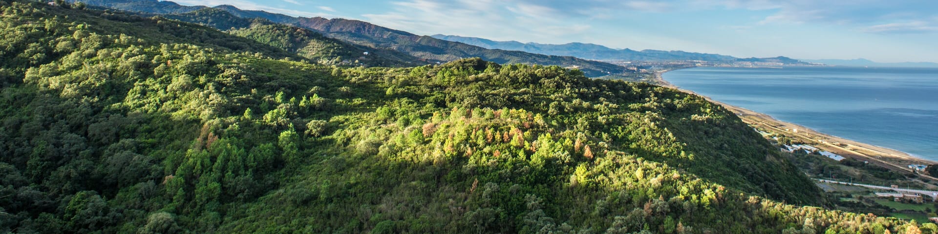 landscape of mountains, sunset and clouds with a beautiful sky, the nature of Algeria in North Africa, Maghreb, plains and grass in the mountain, Mediterranean climate, Forest and green trees. sunrise