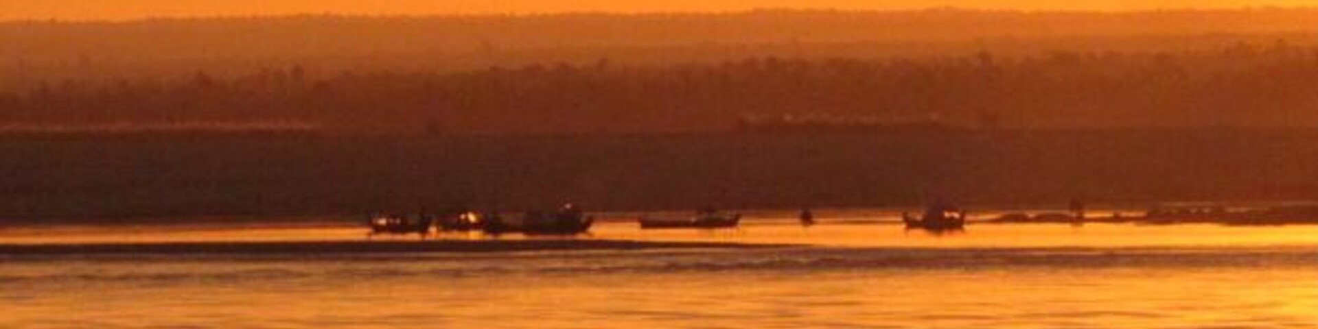 #troveon
Well somewhere near - this was sunrise on the Irrawaddy River as we took the boat from Bagan to Mandalay - we did the tourist delux version which only took all day - the local ferry takes about 3 days.
http://listraveltips.com/burma-myanmar-travel/
