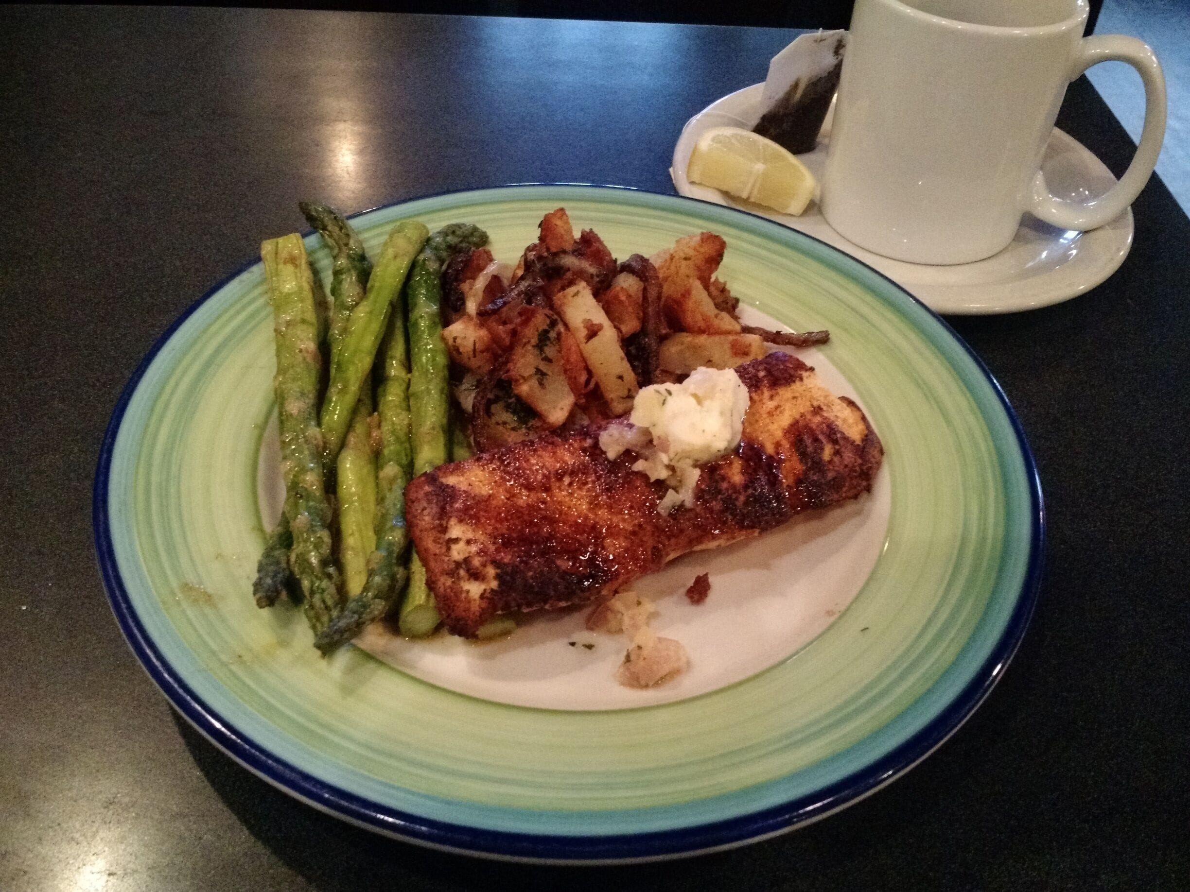 Blackened Alaskan Salmon w/Roasted Asparagus and Lyonnaise Potato's 