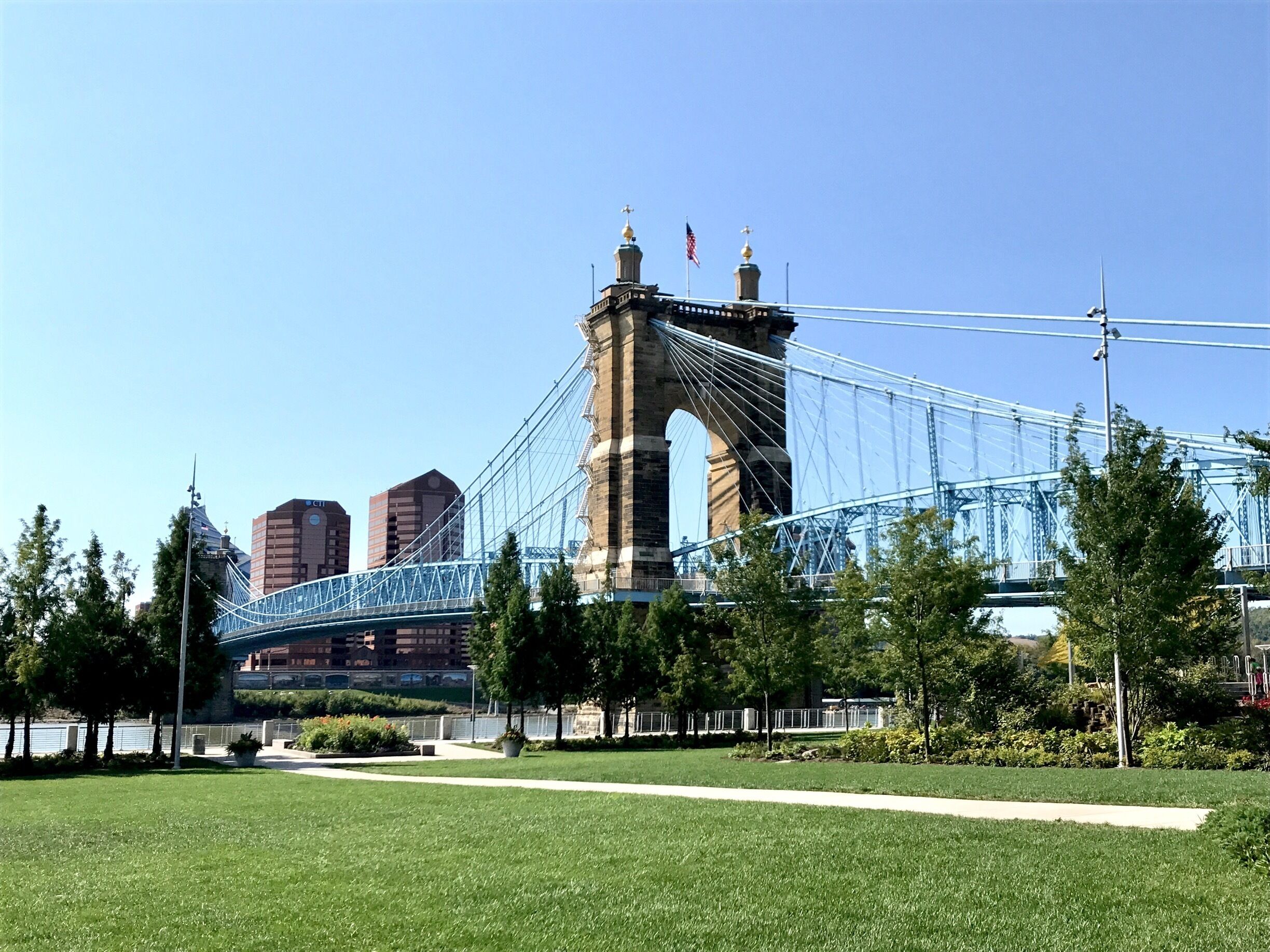 Roebling Bridge stretches across the Ohio River to connect Covington, KY to Cincinnati, OH. The Cincy locals know this as the “Singing Bridge.”