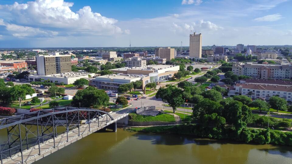 Top view downtown Waco and Cultural District from Washington Avenue Bridge cross Brazos River