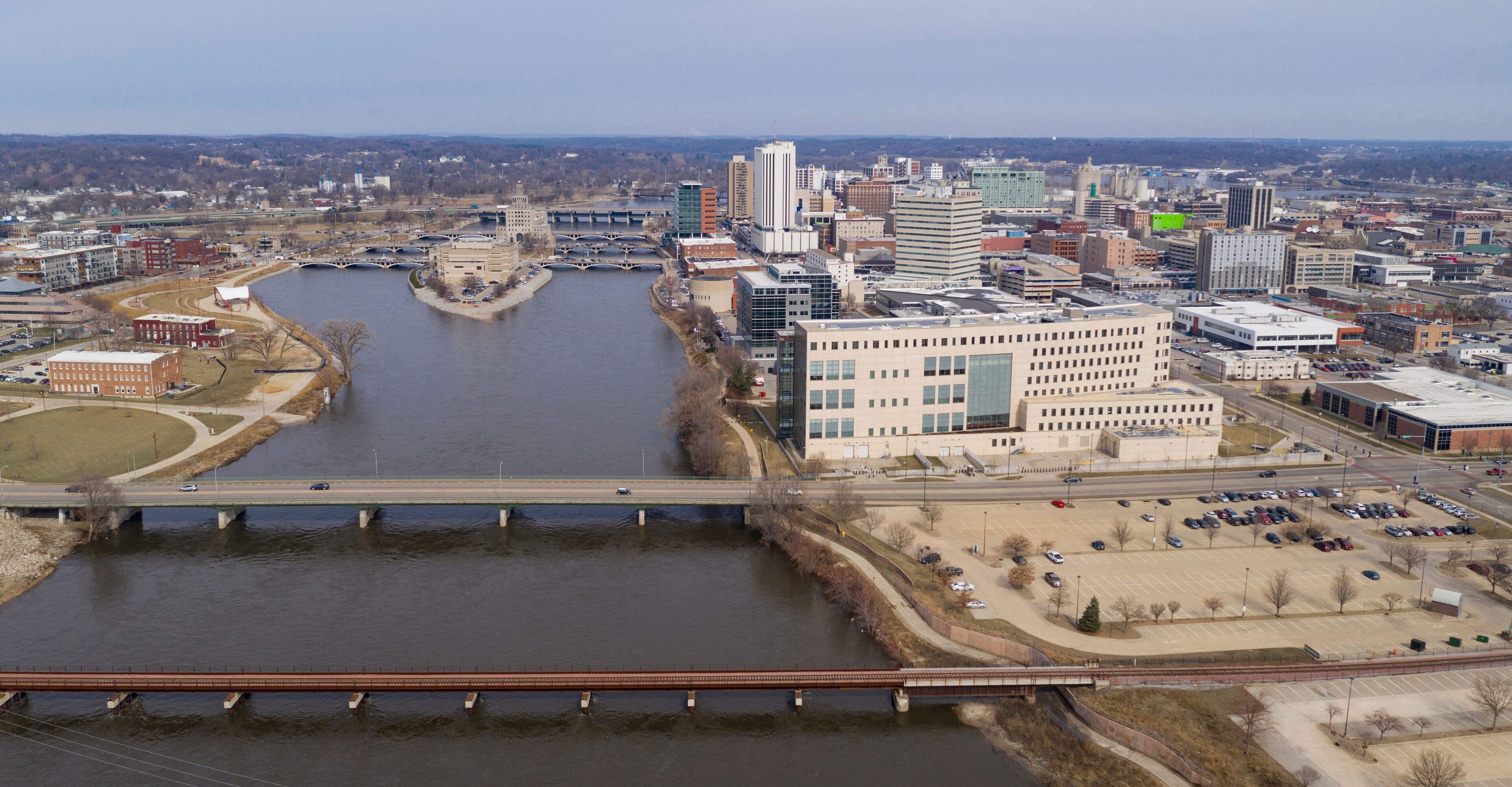 Aerial View Of the Cedar River Running thru a Town in Iowa