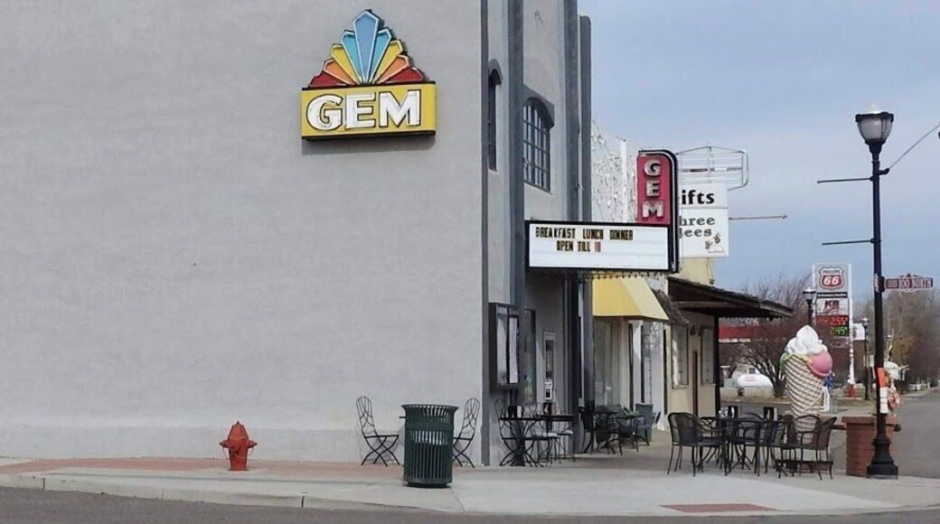 The Gem Theatre (previously known as Kinema Theatre, Hub Theatre) was built in 1909. In 1924, one of the reels of film got stuck in the projector and caught fire, igniting a full reel in the lower magazine. Only the outer shell of the theater survived the fire. The Kinema was rebuilt "as near fireproof as possible" and reopened in 1924. The Kinema Theatre was renamed the Hub Theatre in 1928. In 1933, the theatre was renovated and renamed it the Gem Theatre. After the advent of television, the theater could not attract large enough crowds to pay film rental fees. The Gem Theatre closed about 1986. The title of the last movie, Ferris Bueller's Day Off, remained on the marquee for ten years as the theater sat idle. Sometime after this the theater was again damaged by fire. Mark Childs, owner of Childs Construction, and his wife Heather, a retired dancer, purchased the Gem Theatre in April 2010, after moving to Panguitch from Henderson, Nevada. After replacing the building's fire-damaged roof, the Childs rebuilt the Gem Theatre's interior and reopened it on 28 May 2011.
#OnTheRoad