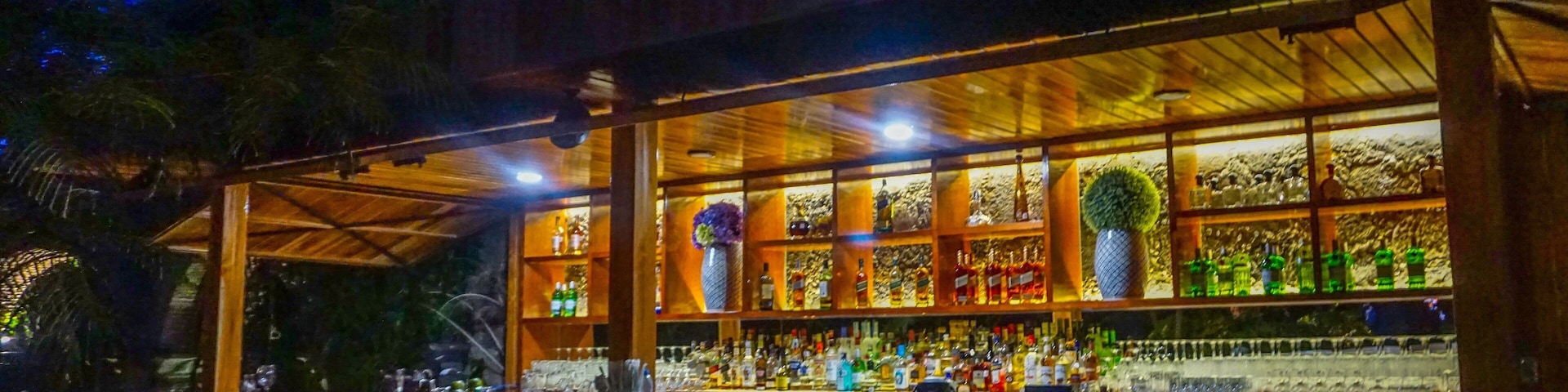 The most beautiful outdoor bar and dining experience 🍹🌺🌴🦋