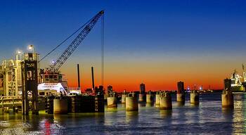 Port Aransas, Texas - 9-28-2024. Port Aransas at sunset, along the ship channel, where commerce keeps moving in and out for various types of industries.