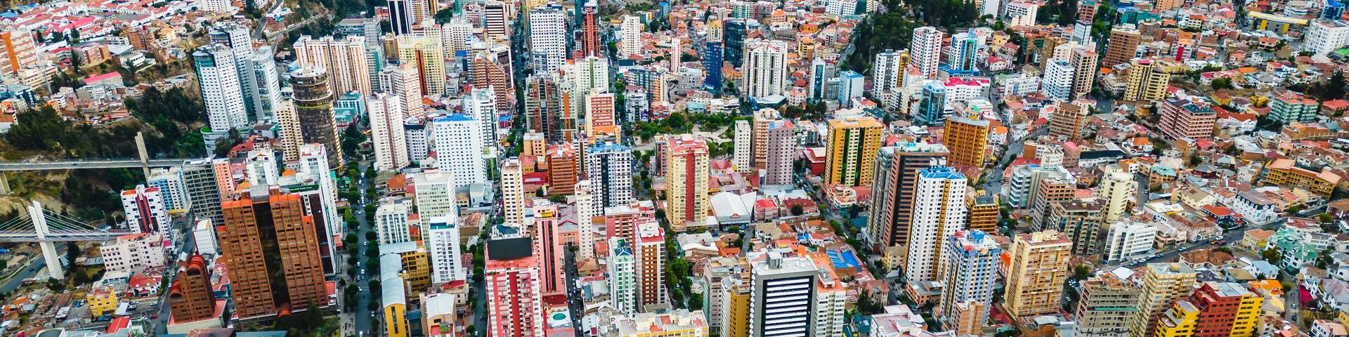 aerial of colourful district in la paz Bolivia capital drone above skyline cityscape skyscraper