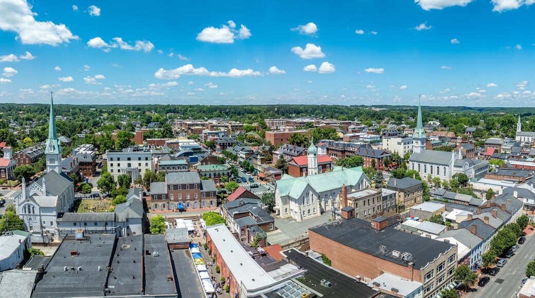 Aerial view Fredericksburg Virginia with Circuit Court building , historic business district, Baptist church, Chatham bridge over Rappahannock River