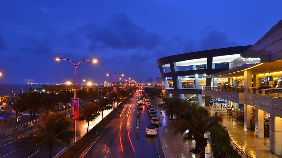 Pasay, Metro Manila, Philippines - June 2017: Mall of Asia seaside section during the evening.