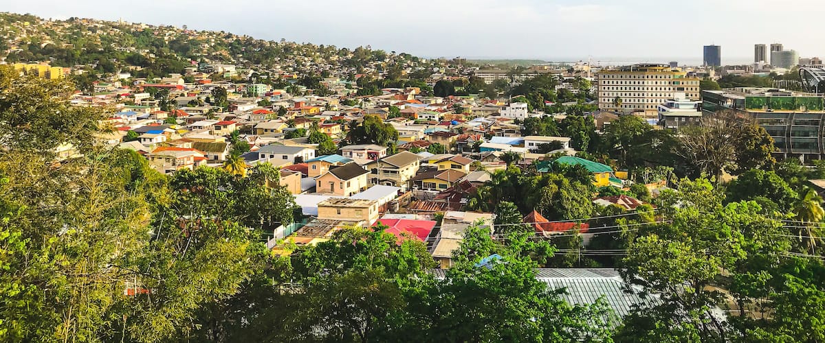 View of the city of Port of Spain Trinidad with cloudy sky and Mountains