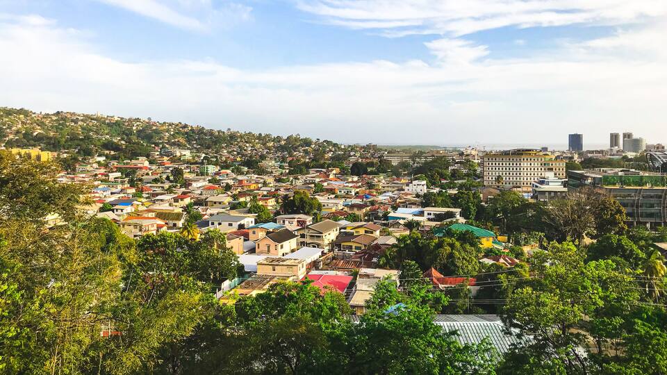 View of the city of Port of Spain Trinidad with cloudy sky and Mountains