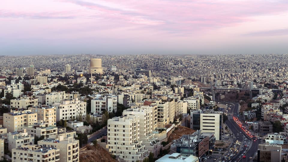 Wide shot for Amman mountains at evening after the sunset