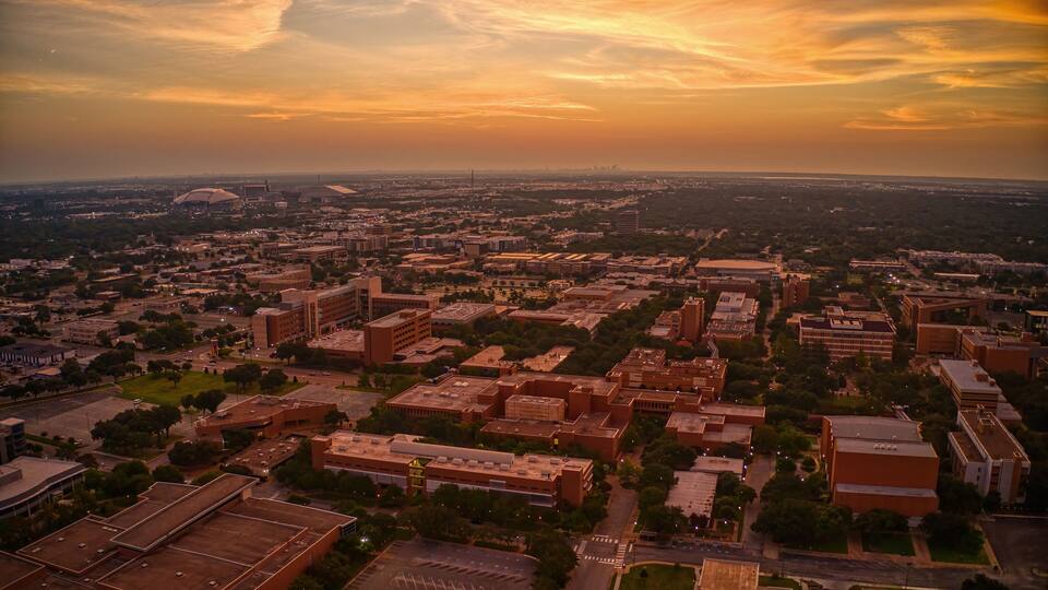 Aerial View of a large Public University in Arlington, Texas at Sunrise